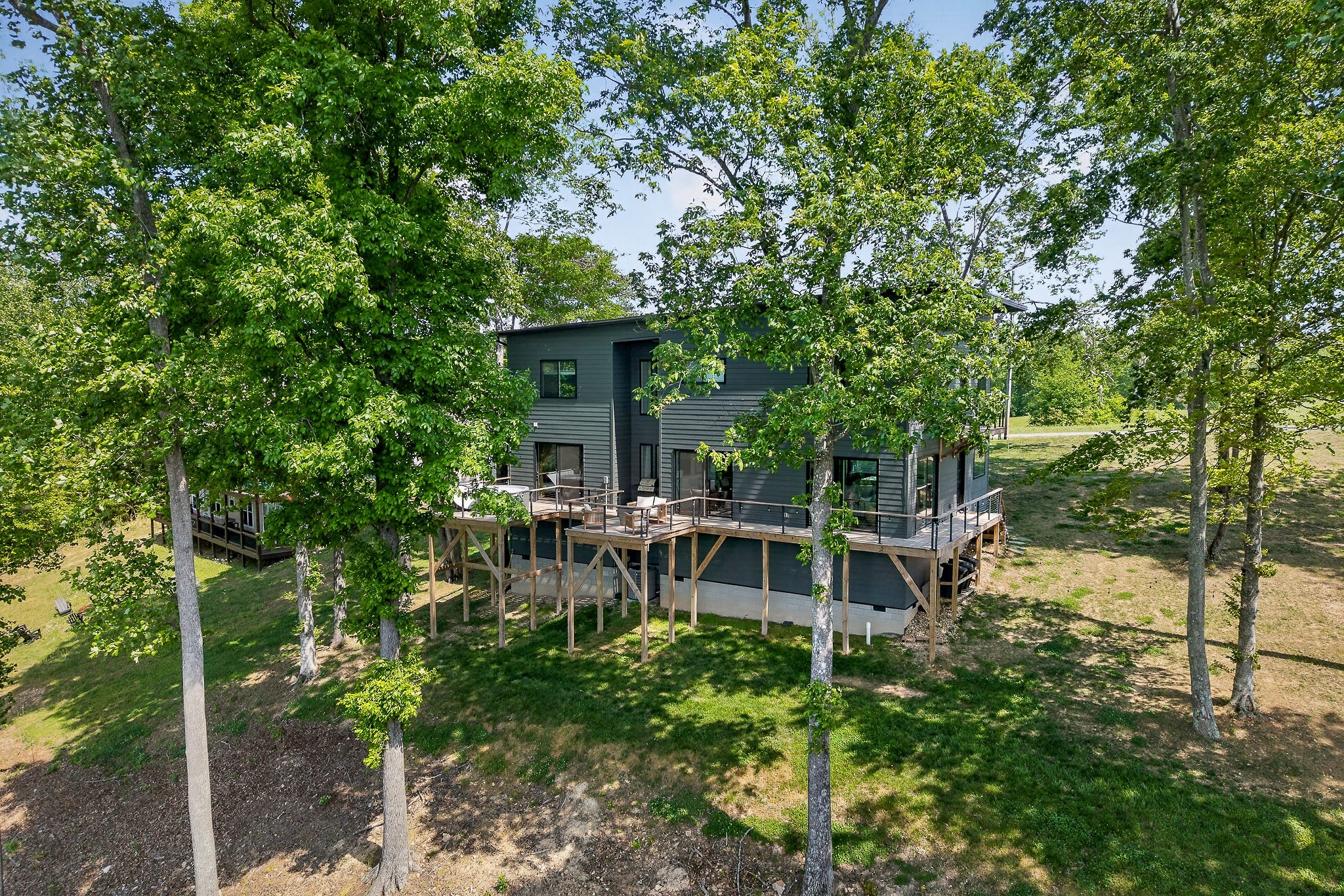 1171 Hutchins Bend Road Sparta, TN 38583 - Photo 63 of 74 a view of house with backyard and sitting area