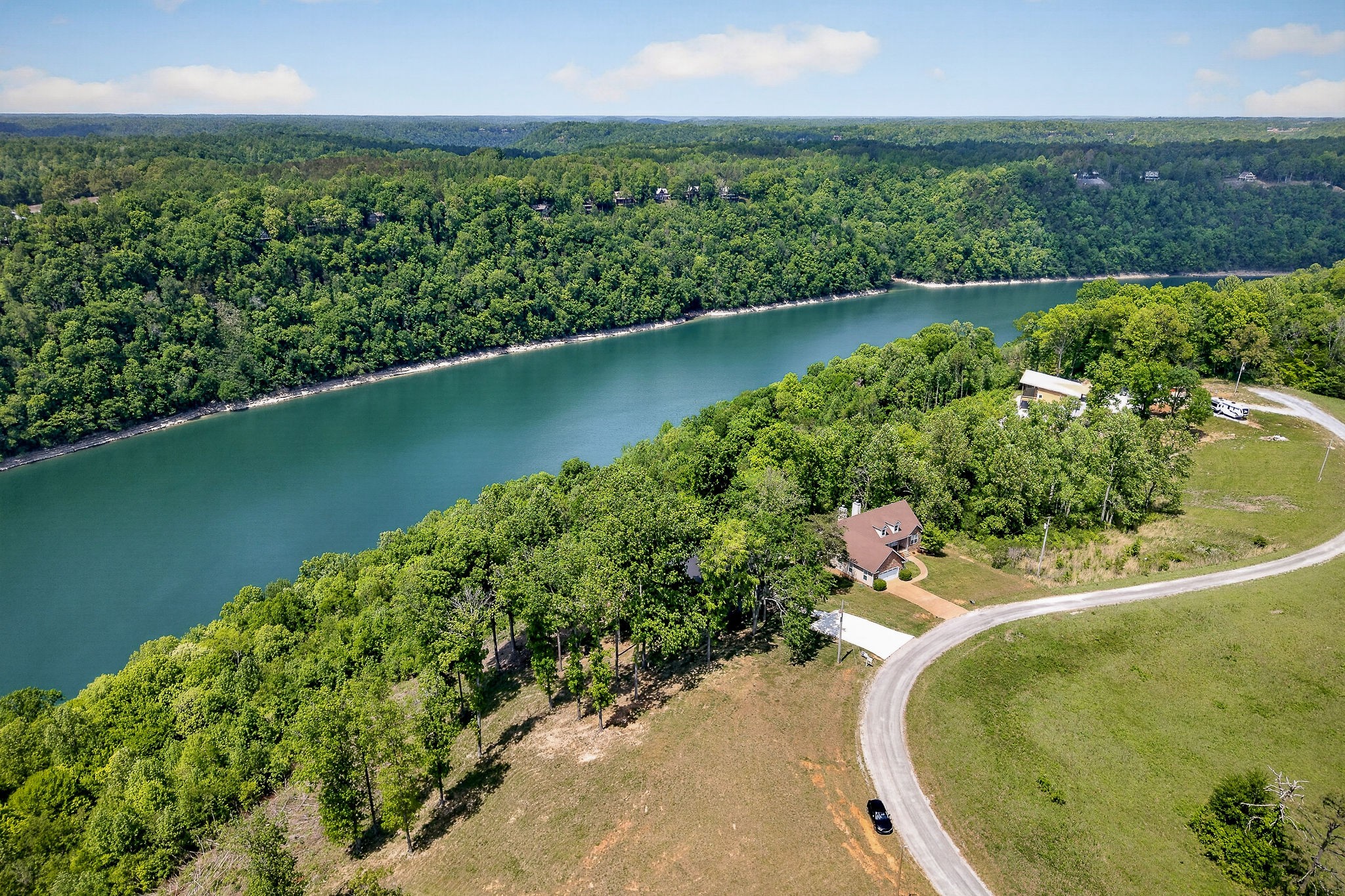1171 Hutchins Bend Road Sparta, TN 38583 - Photo 68 of 74 an aerial view of a house with a yard and lake view