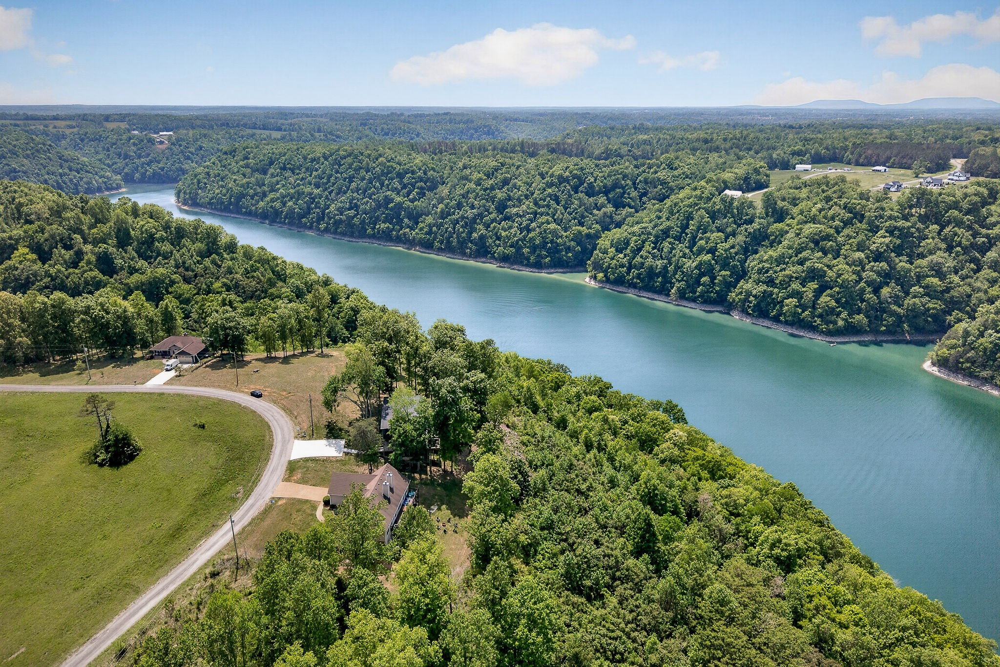 1171 Hutchins Bend Road Sparta, TN 38583 - Photo 70 of 74 an aerial view of a residential houses with outdoor space and trees all around