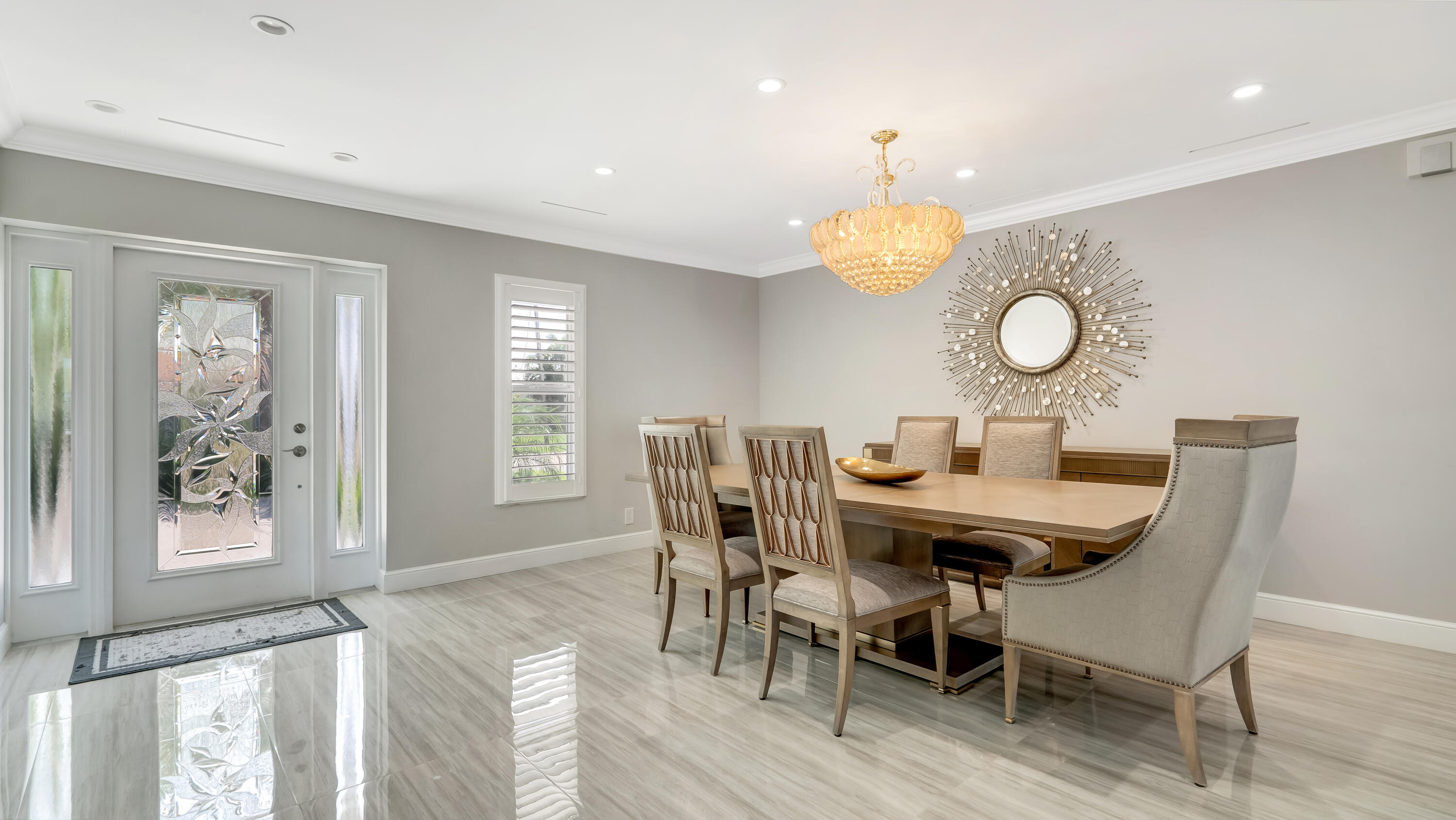 831 Dover Street Boca Raton, FL 33487 - Photo 16 of 71 a view of a dining room with furniture and wooden floor