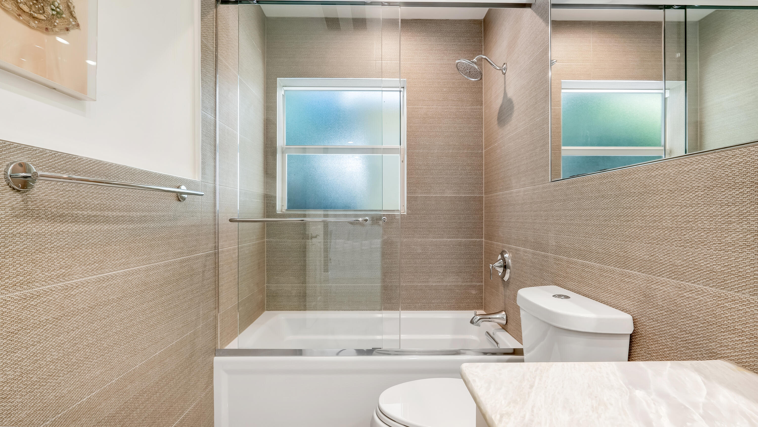 831 Dover Street Boca Raton, FL 33487 - Photo 43 of 71 a bathroom with a sink and toilet