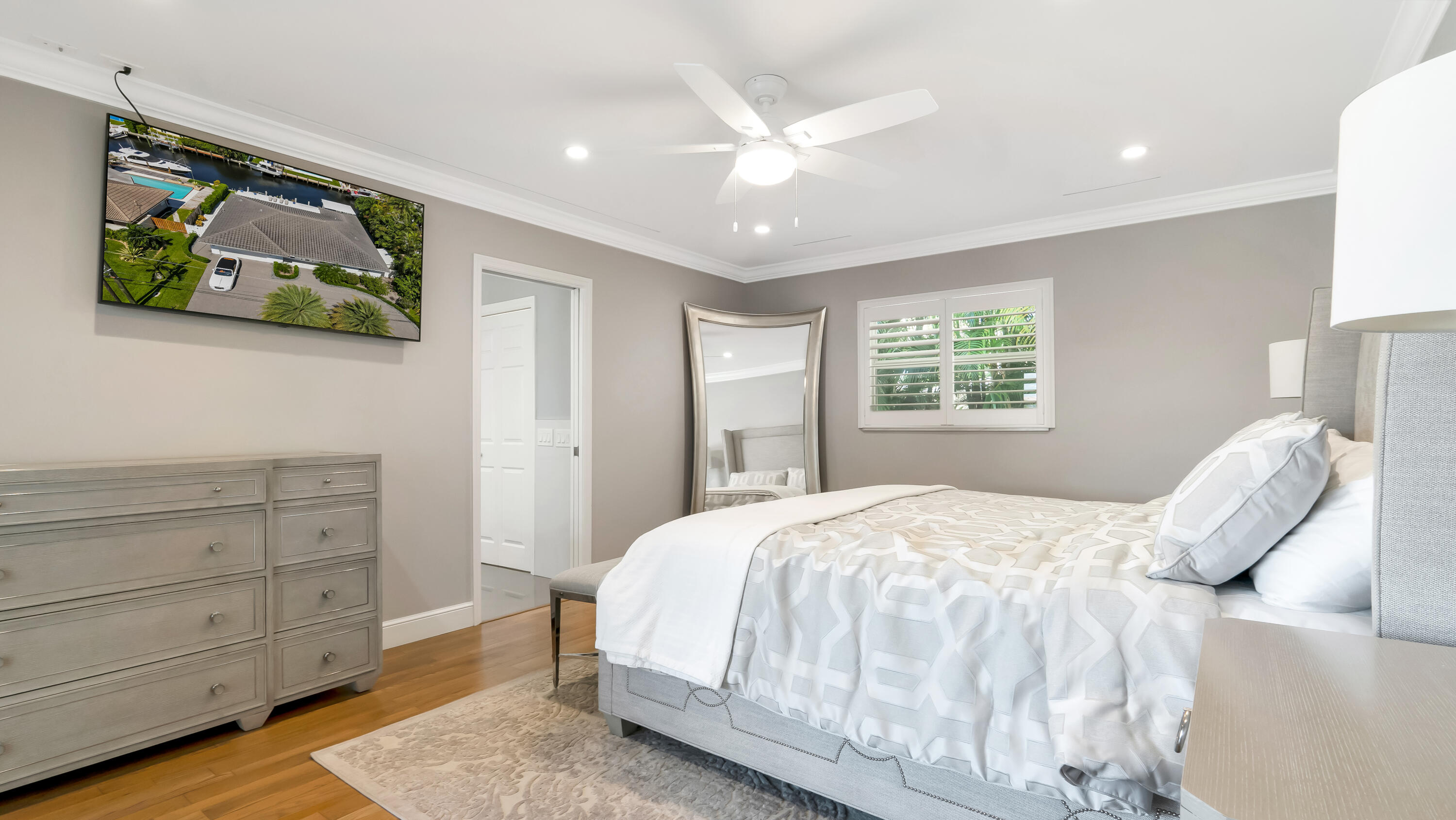 831 Dover Street Boca Raton, FL 33487 - Photo 48 of 71 a bedroom with a bed and a window