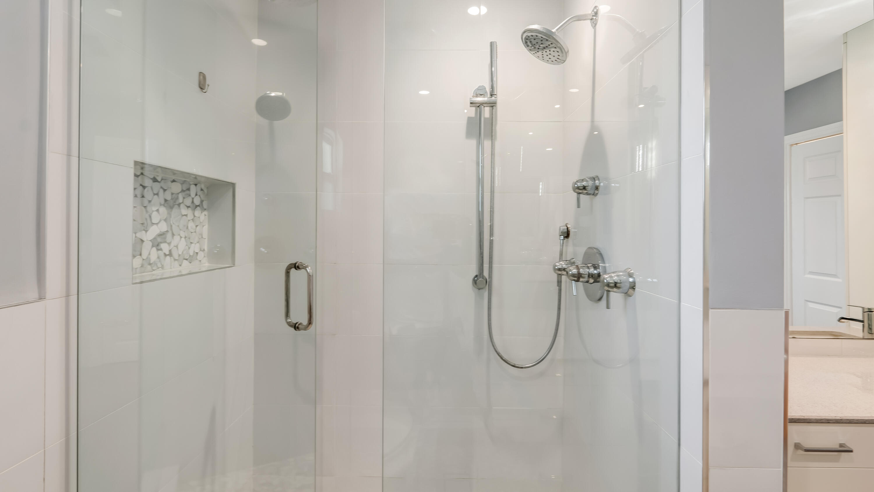 831 Dover Street Boca Raton, FL 33487 - Photo 50 of 71 a bathroom with a glass shower door