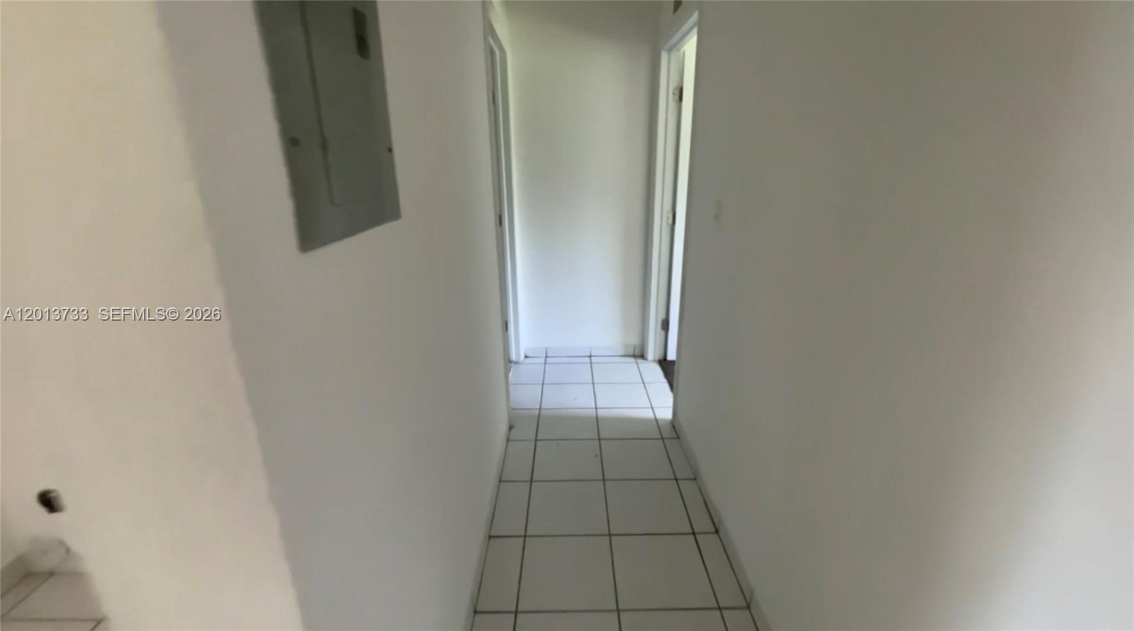 209 Northeast 141st Street, Unit 4 Miami, FL 33161 - Photo 9 of 13 a bathroom with a shower and toilet