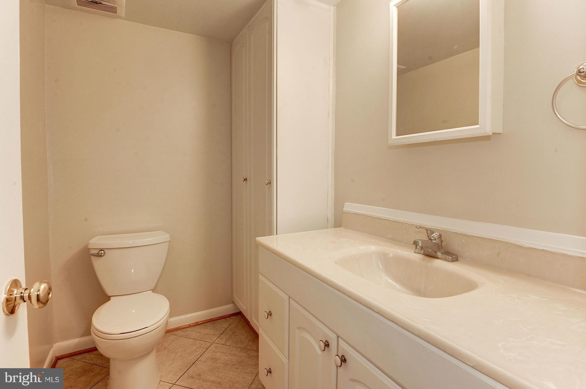 11184 Saffold Way Reston, VA 20190 - Photo 8 of 30 Powder Room serving living areas