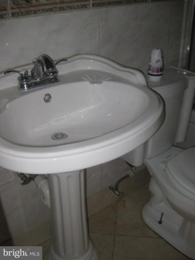 7417 Jervis Street Springfield, VA 22151 - Photo 14 of 16 main bath sink