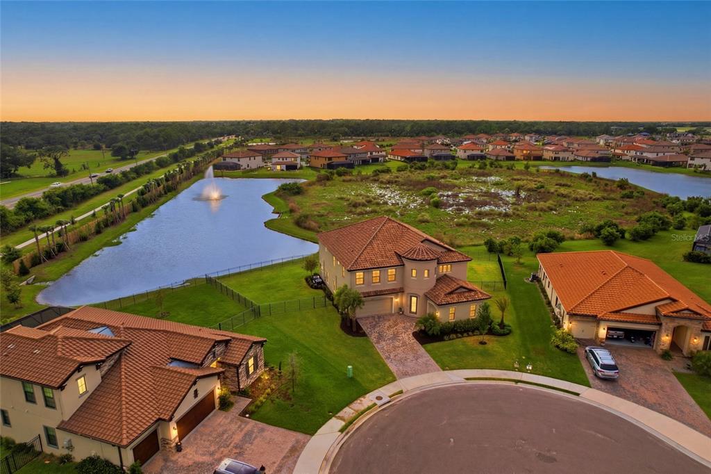 8207 Rushton Place Parrish, FL 34219 - Photo 2 of 65 an aerial view of a house with a garden