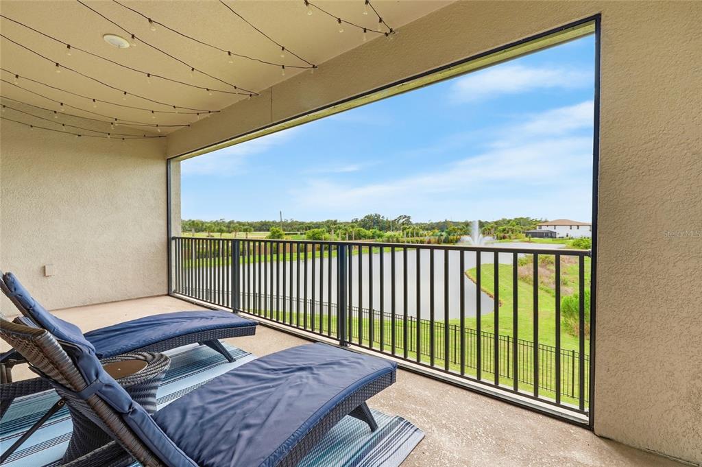 8207 Rushton Place Parrish, FL 34219 - Photo 33 of 65 a view of a balcony with wooden floor and outdoor space