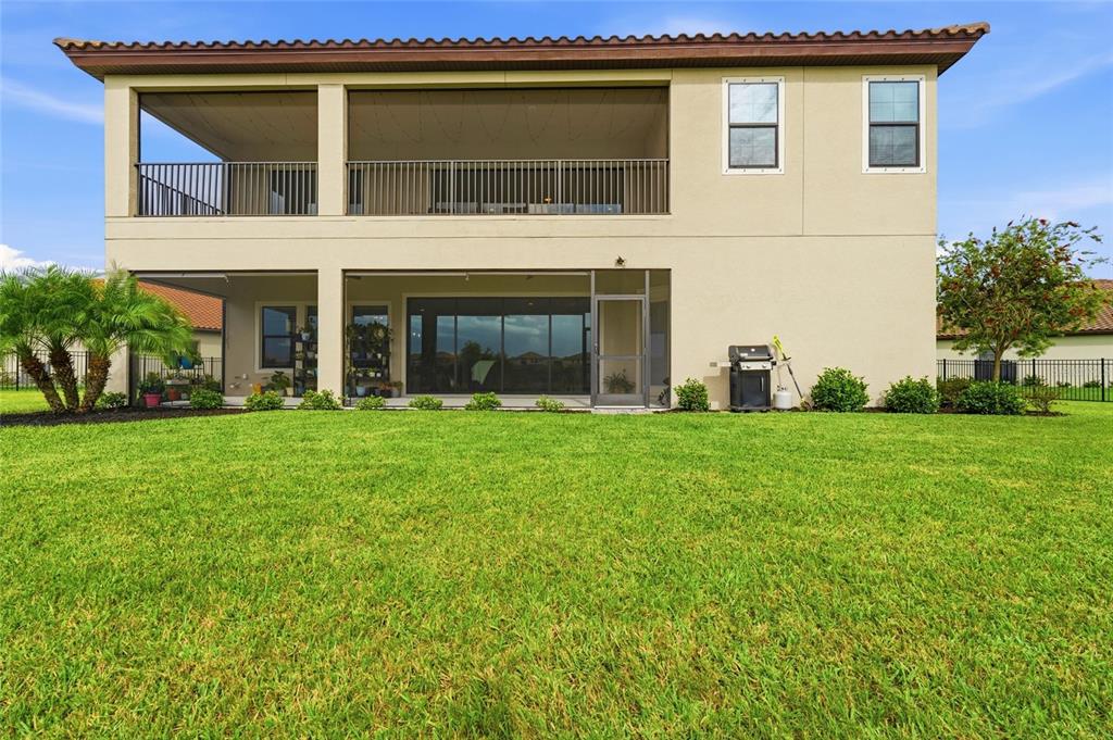 8207 Rushton Place Parrish, FL 34219 - Photo 52 of 65 a house view with a garden space