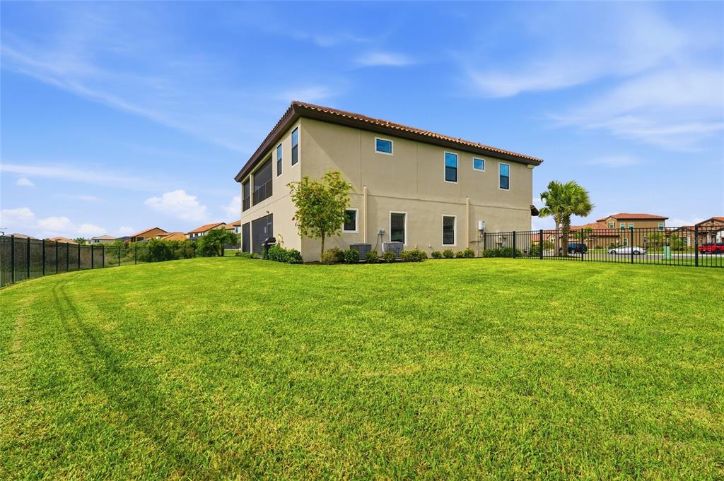 8207 Rushton Place Parrish, FL 34219 - Photo 53 of 65 a front view of house with garden