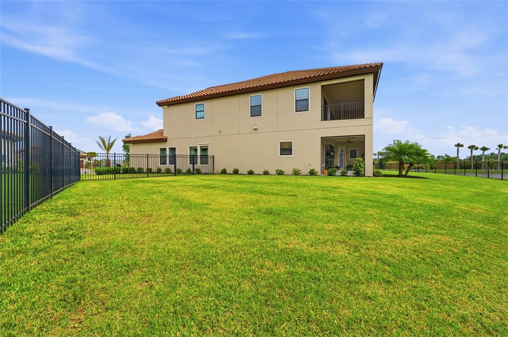 8207 Rushton Place Parrish, FL 34219 - Photo 54 of 65 a view of a house with a yard
