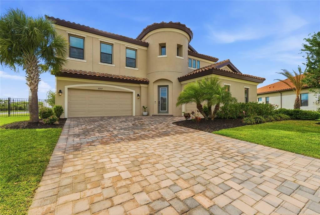 8207 Rushton Place Parrish, FL 34219 - Photo 56 of 65 a front view of a house with a yard