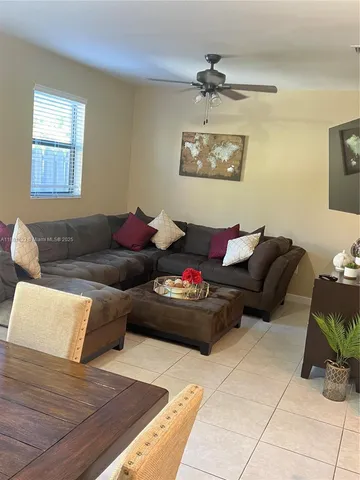 a bed room with a bed and a television