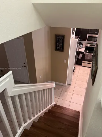 a view of a swimming pool with a lounge chairs