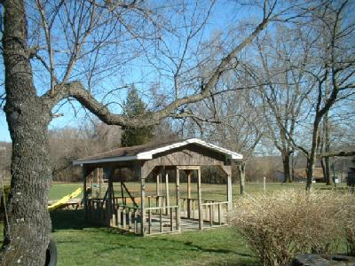 4295 Lower Saucon Road Hellertown, PA 18055 - Photo 2 of 12 a view of a wooden house with a yard