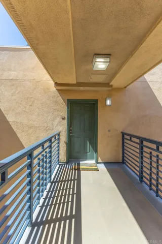 a kitchen with granite countertop a sink and cabinets