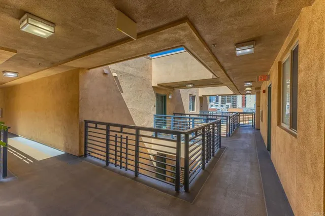 a kitchen with stainless steel appliances granite countertop a stove top oven and sink