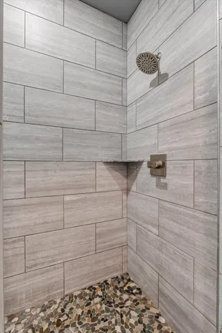 a view of a room with racks on the wall