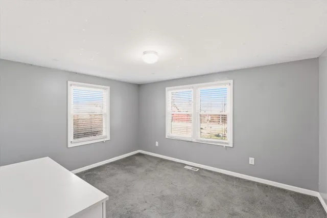 an empty room with closet