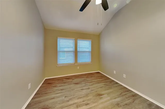 a bathroom with a toilet and a bathtub