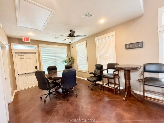 1000 Spring Loop, Unit 1806 College Station, TX 77840 - Photo 30 of 33 a view of a workspace with furniture and a window