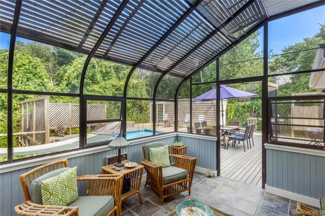 a outdoor living space with furniture and garden view