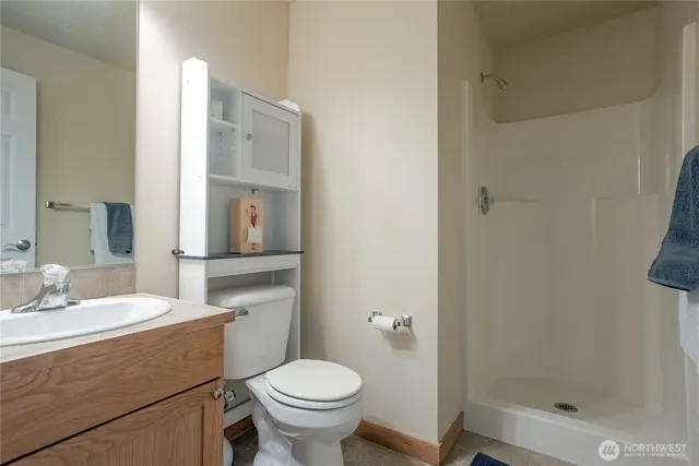 a view of a livingroom with stairs