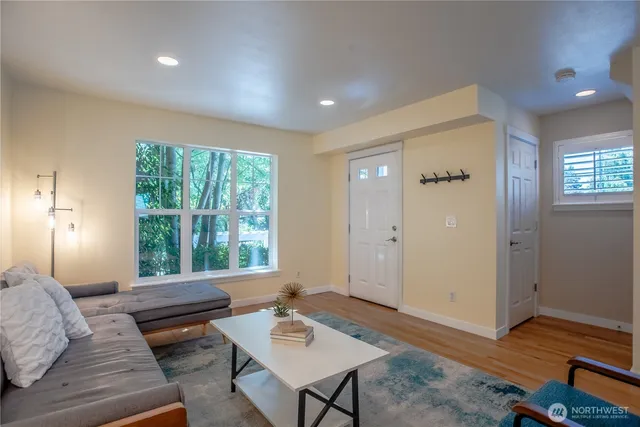 a bedroom with furniture and a window