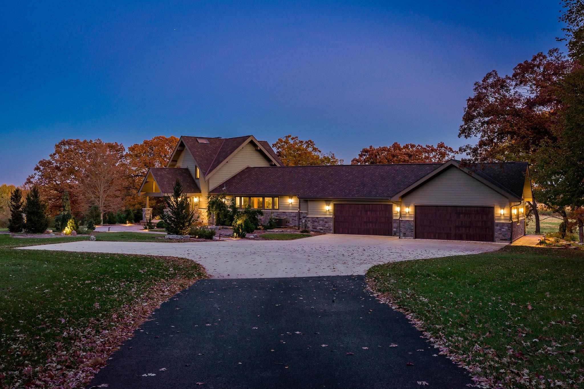 13345 Russellville Road Capron, IL 61012 - Photo 35 of 92 a view of a big house with a big yard and large trees