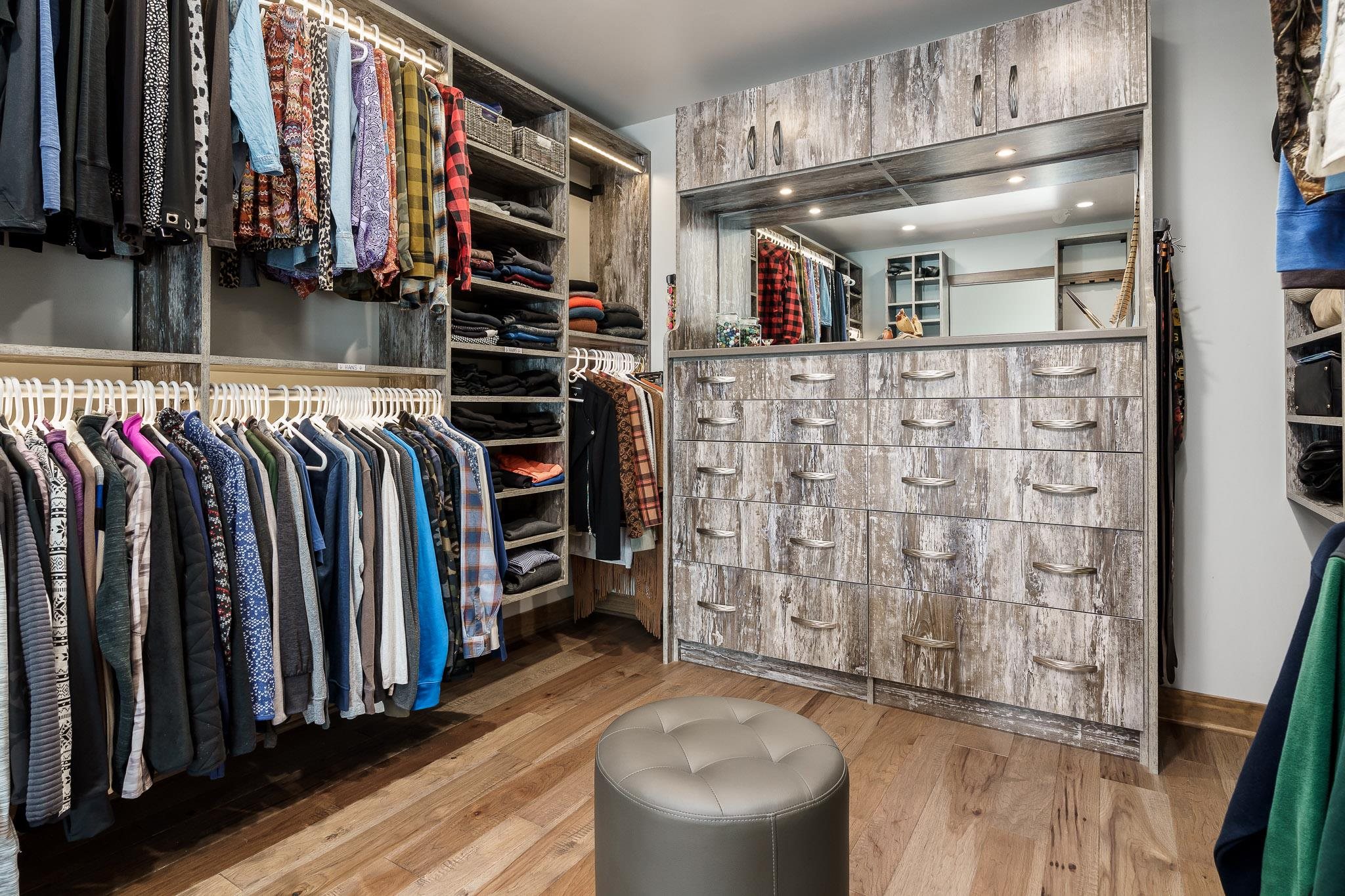 13345 Russellville Road Capron, IL 61012 - Photo 77 of 92 a view of walk in closet with clothes and shoes