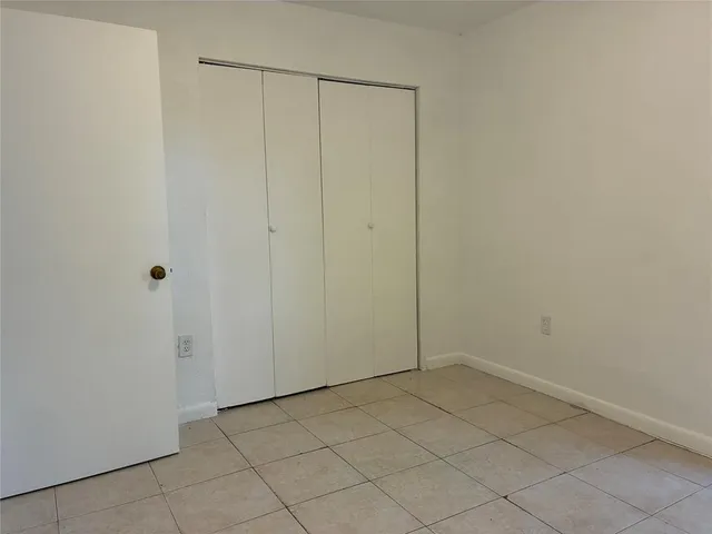 a view of room with white walls