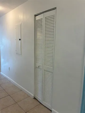 an empty room with cabinet