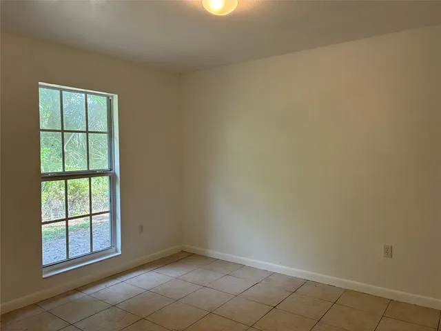 a bathroom with a toilet a sink and bathtub