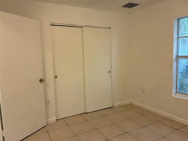 a bathroom with a toilet a sink and bathtub