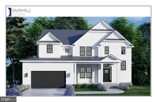 a view of house with yard and green space