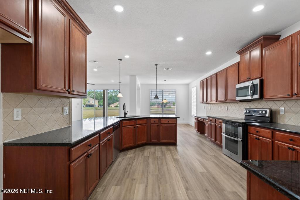 10917 Dancing Rabbit Lane Jacksonville, FL 32210 - Photo 4 of 121 Dancing Rabbit Kitchen to Dinette 2