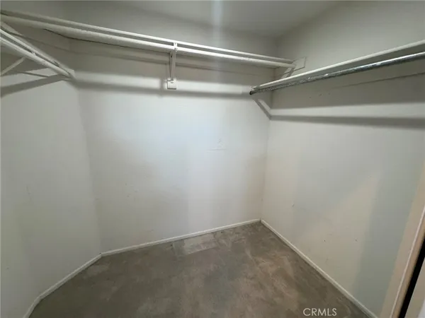 a view of an empty walk in closet