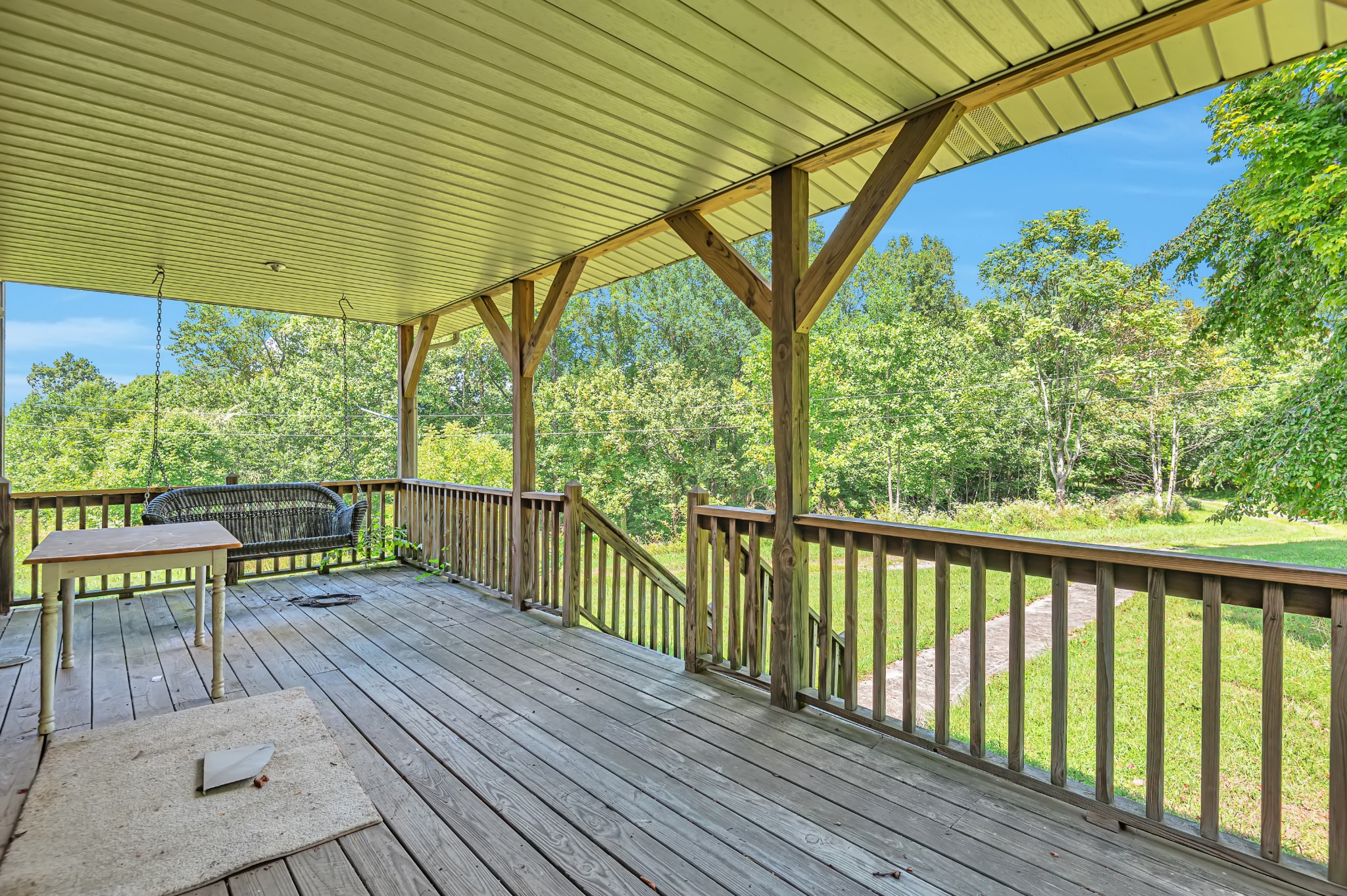 450 Womack Road Portland, TN 37148 - Photo 2 of 22 a view of a chairs and table in the balcony