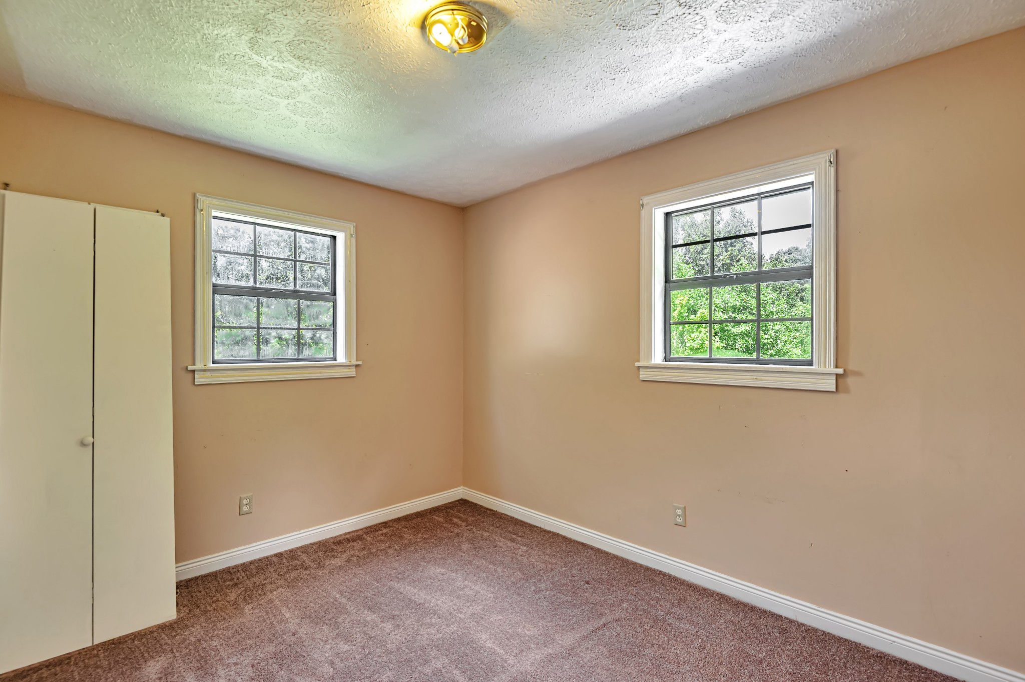 450 Womack Road Portland, TN 37148 - Photo 5 of 22 an empty room with windows