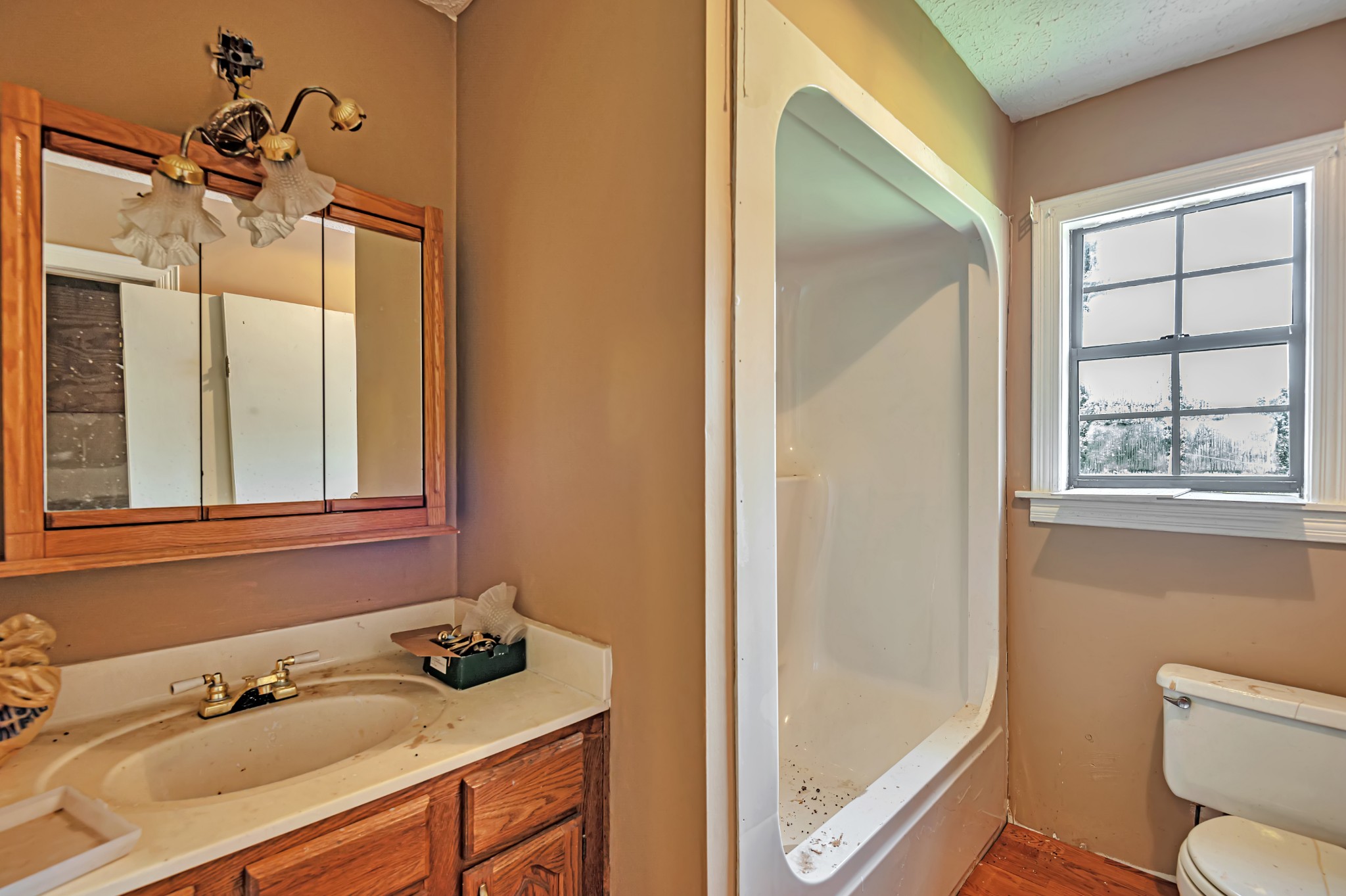 450 Womack Road Portland, TN 37148 - Photo 6 of 22 a bathroom with a sink and a mirror
