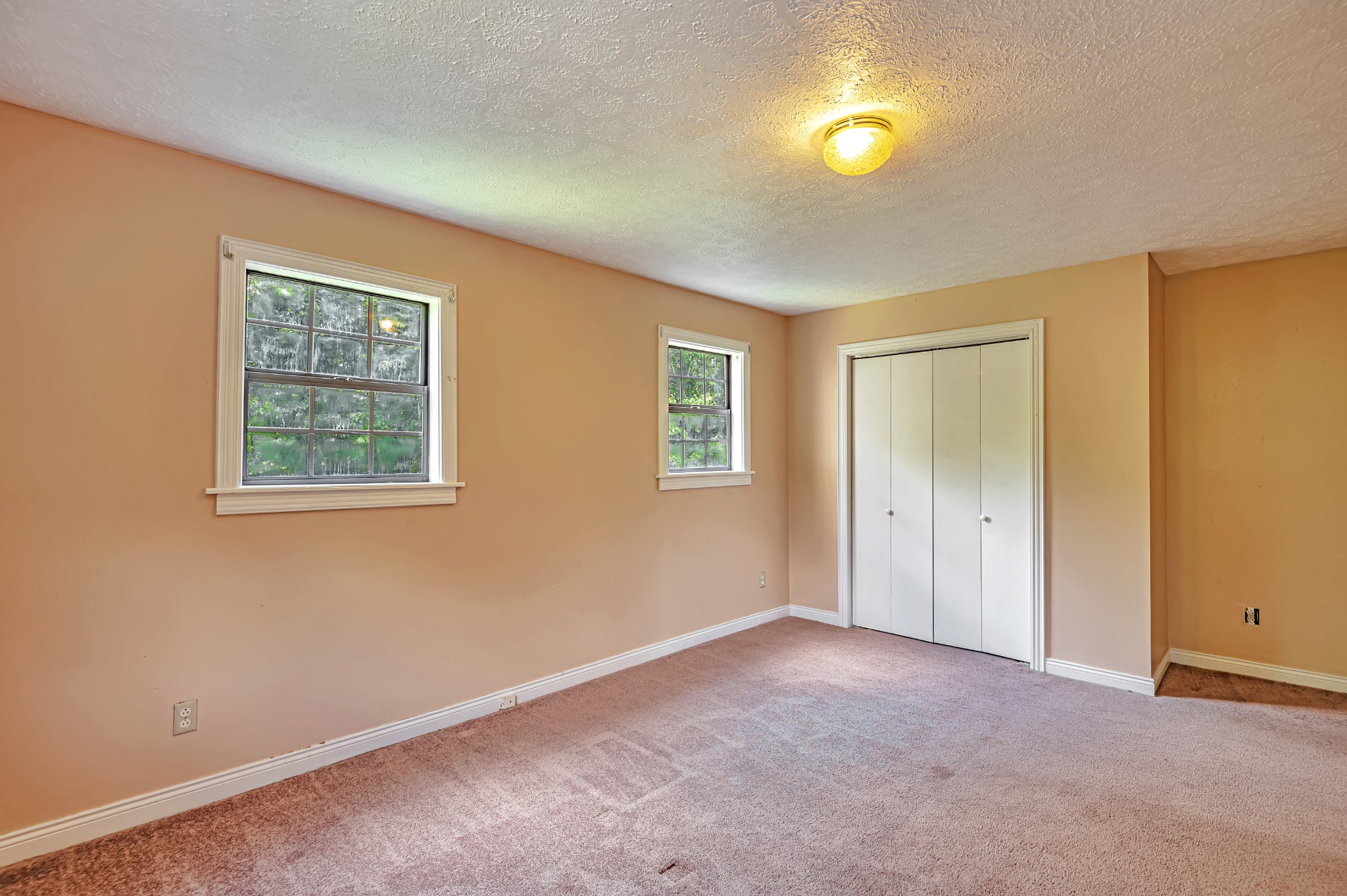 450 Womack Road Portland, TN 37148 - Photo 7 of 22 a view of an empty room with a window
