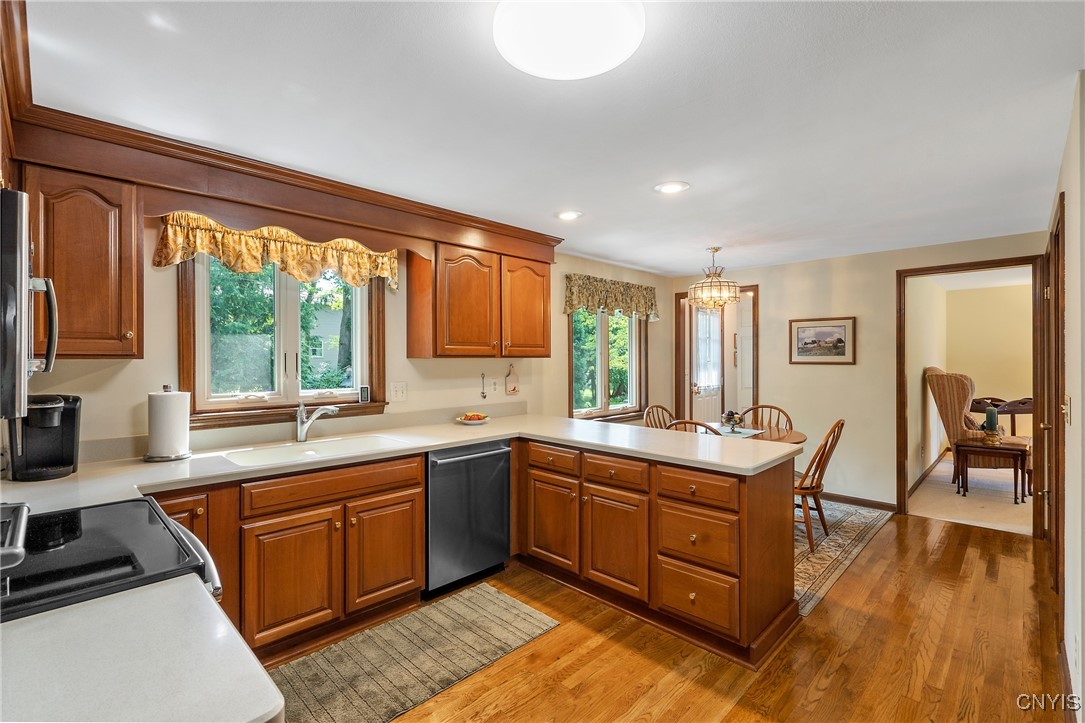 4318 Cinnamon Path Clay, NY 13090 - Photo 14 of 50 Here we can see how the living room connects to th