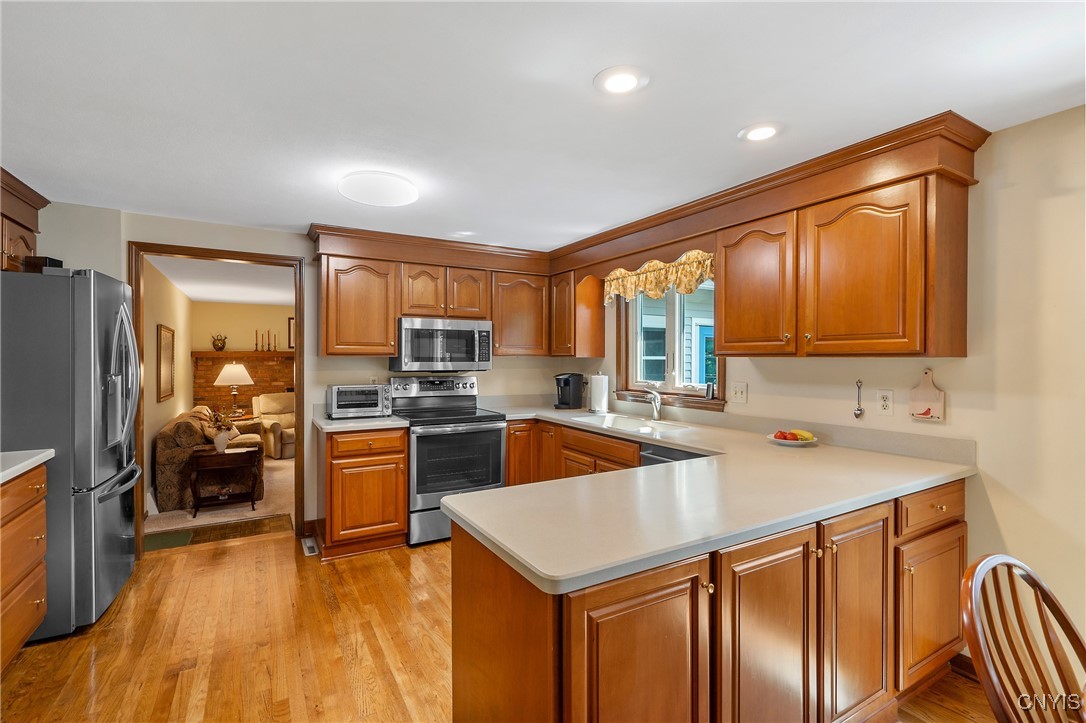 4318 Cinnamon Path Clay, NY 13090 - Photo 19 of 50 And now we'll move to the family room straight ahe