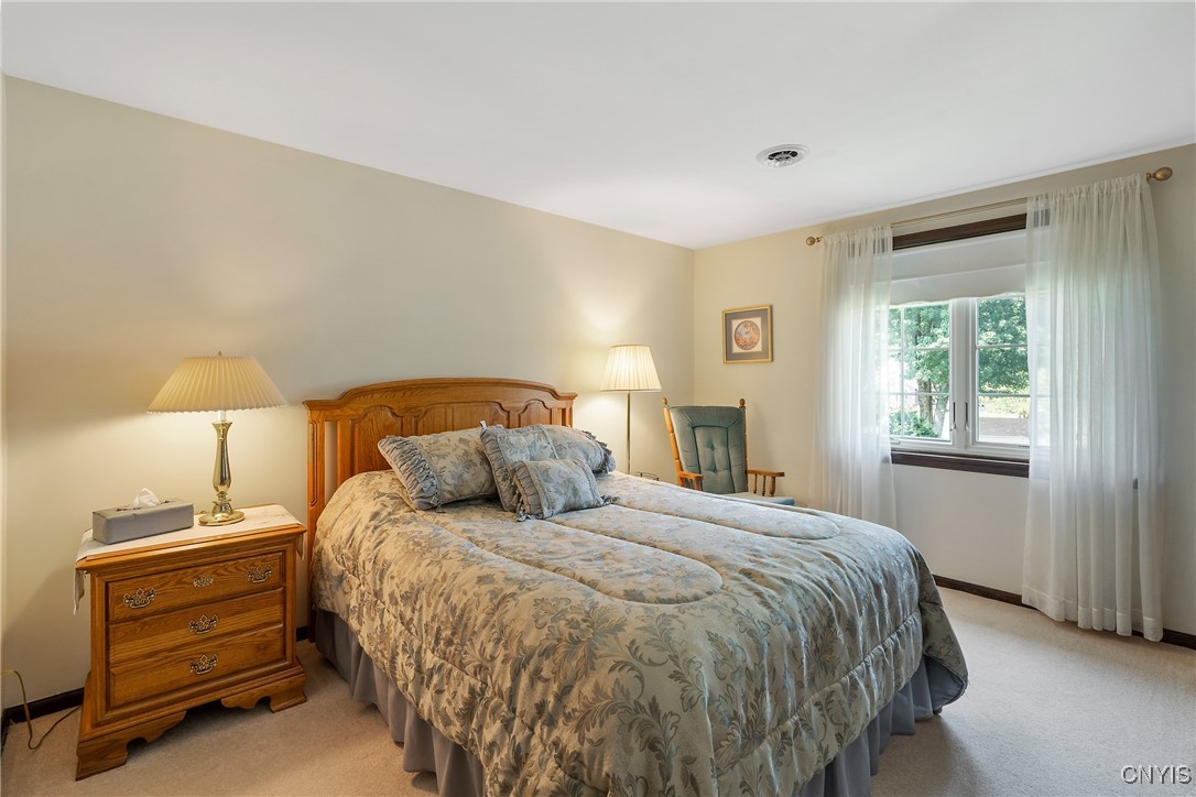 4318 Cinnamon Path Clay, NY 13090 - Photo 32 of 50 Next, we see this huge bedroom that rivals the spa