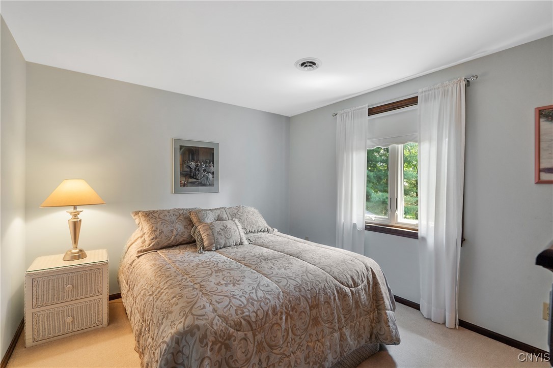 4318 Cinnamon Path Clay, NY 13090 - Photo 36 of 50 This back corner bedroom adjacent to the primary b