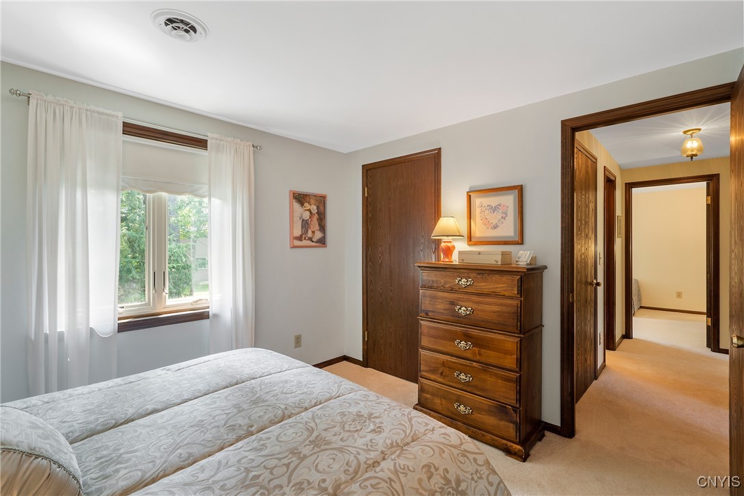 4318 Cinnamon Path Clay, NY 13090 - Photo 37 of 50 And not only can we see the closet of the room her