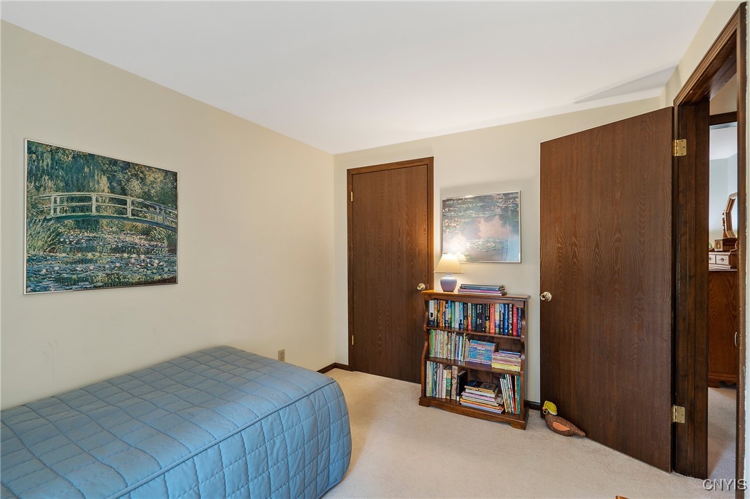 4318 Cinnamon Path Clay, NY 13090 - Photo 39 of 50 The closet is nestled in the corner here. Now let'