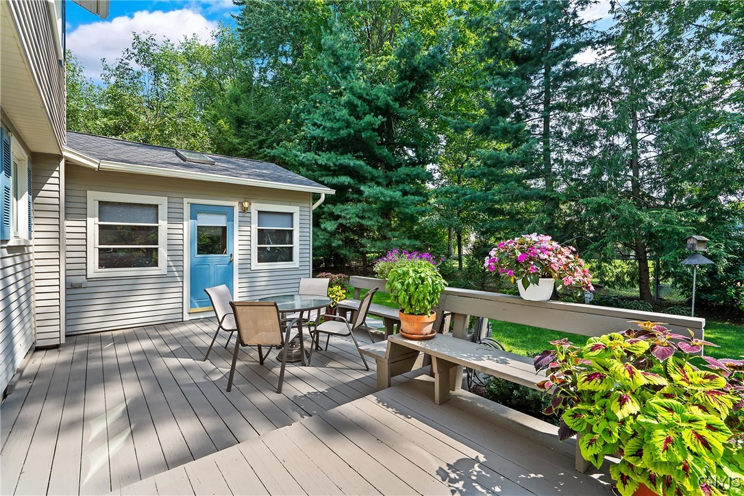 4318 Cinnamon Path Clay, NY 13090 - Photo 41 of 50 Built-in benches at the edge of the deck provide s