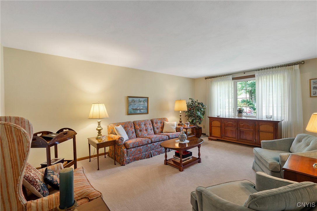 4318 Cinnamon Path Clay, NY 13090 - Photo 5 of 50 This long, spacious room offers versatility in its