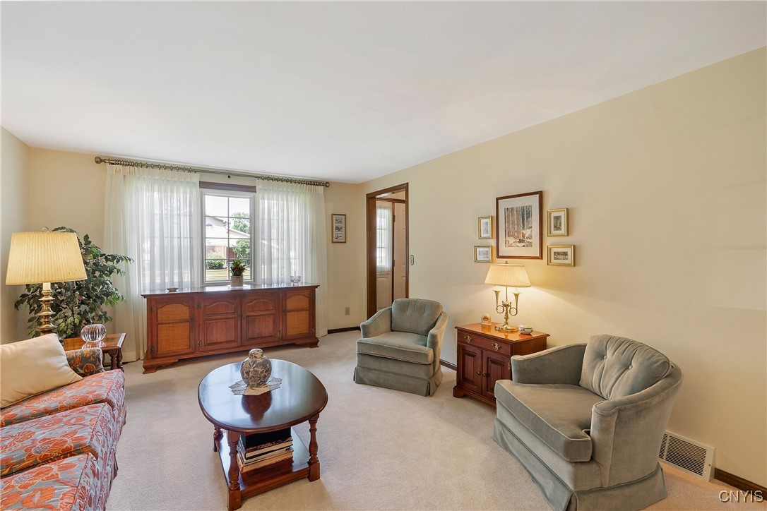 4318 Cinnamon Path Clay, NY 13090 - Photo 7 of 50 The giant Anderson windows across the front of the